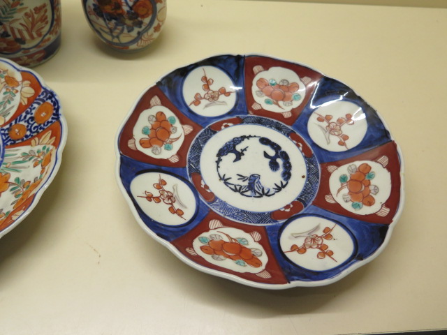 Two pairs of Imari vases, tallest 22cm and three Imari plates, all generally good minor chips to - Image 2 of 7