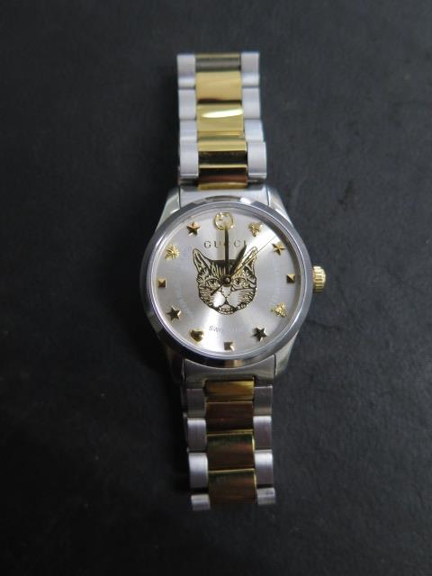 A ladies Gucci G-timeless feline two tone steel 27mm bracelet wristwatch, no box or papers but in