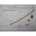 Three 14ct gold chains, longest 45cm, three 14ct pendants, total weight approx 15 grams, and a 9ct