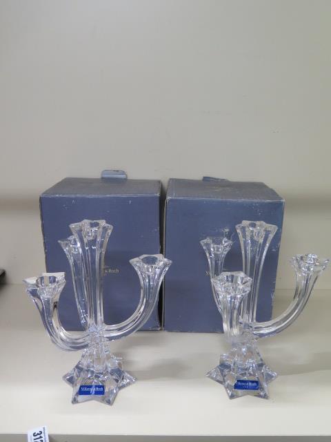 A boxed pair of Villeroy and Boch glass candlabra, 23cm tall, in good condition