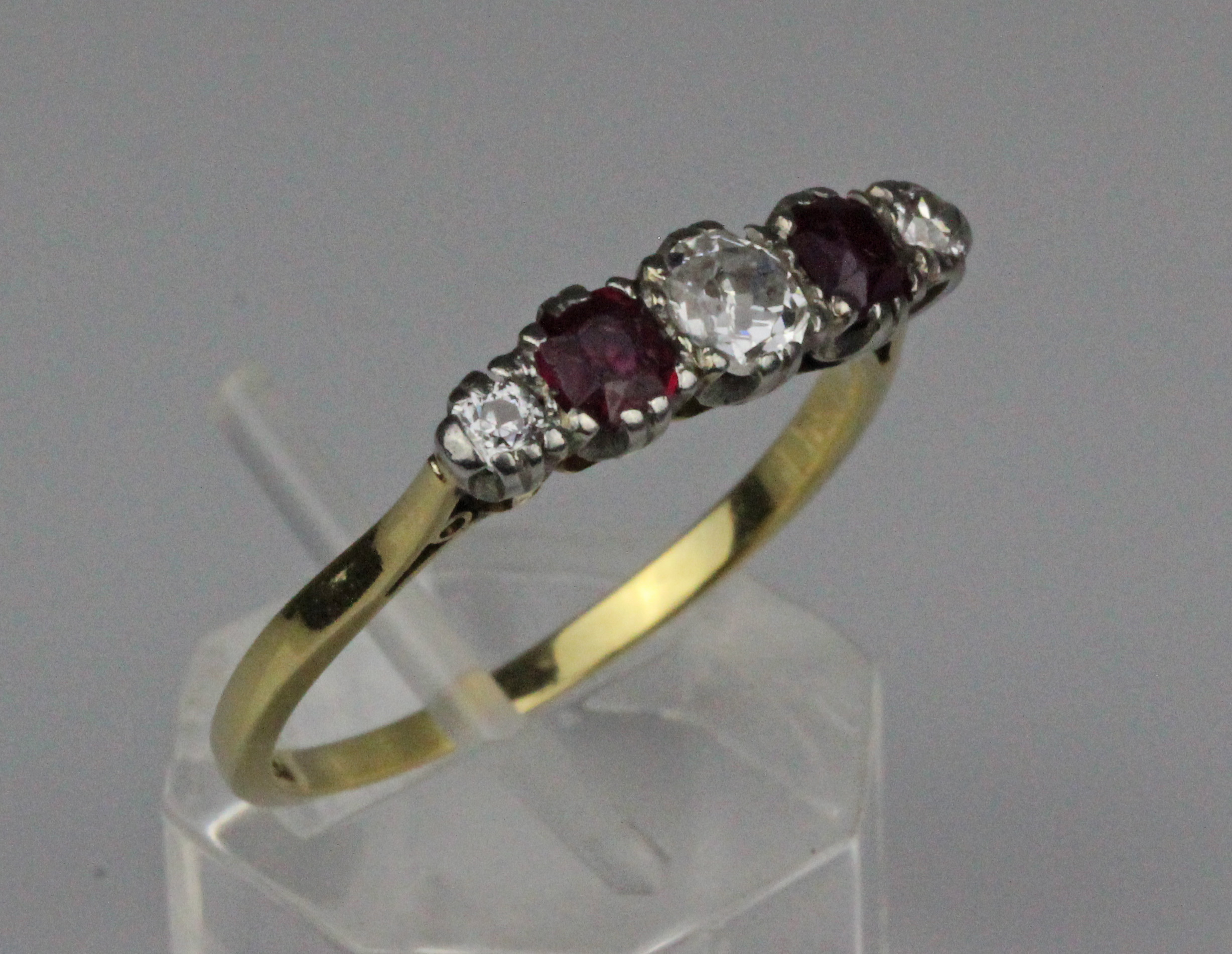 A ruby and diamond five stone ring, the claw set central old brilliant cut diamond 4.1mm x 4mm - Image 2 of 5