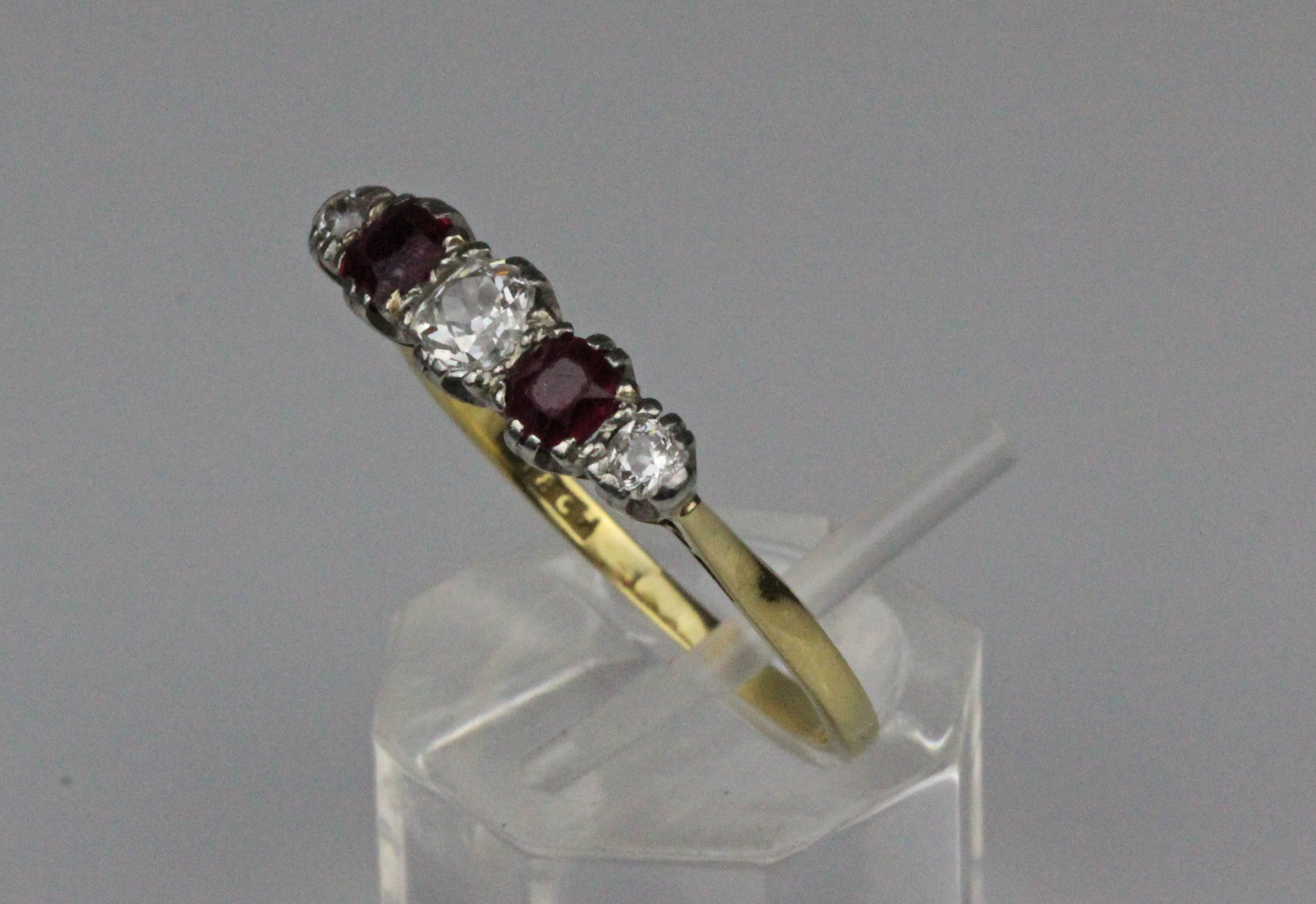 A ruby and diamond five stone ring, the claw set central old brilliant cut diamond 4.1mm x 4mm - Image 3 of 5