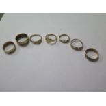 Seven 9ct yellow gold rings, 14.6 grams, sizes G to O