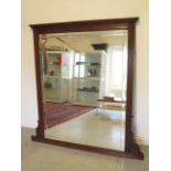 An Edwardian mahogany over mantle mirror with bevel edge glass, 138cm tall x 134cm wide