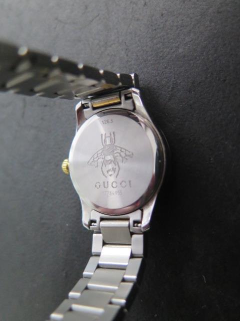 A ladies Gucci G-timeless feline two tone steel 27mm bracelet wristwatch, no box or papers but in - Image 4 of 5