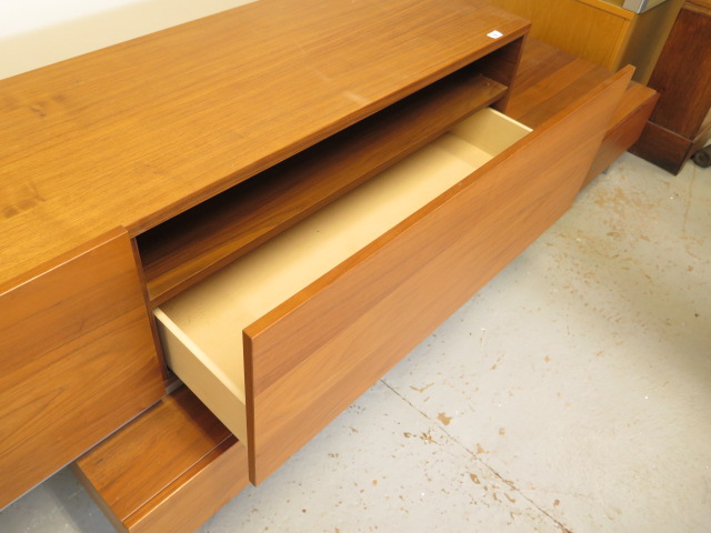 A teak effect four drawer sideboard TV unit adjustable in length, 71cm tall x 61cm deep - Image 2 of 2