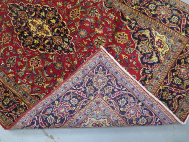 A hand knotted woollen fine Kashan rug, 2.20m x 1.35m, in good condition - Image 4 of 4