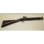 A flintlock canon barrelled blunderbuss, the lock signed Cox, barrel length 38cm, total length 79cm,