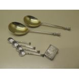 A pair of silver Apostle type spoons, four silver salt spoons and a silver vesta, total weight