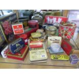 A collection of shop tins, Huntley, Palmer, Victory V, W.Crawfod etc.
