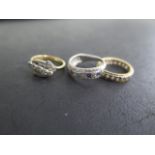 Two 18ct rings and a platinum ring, two set with small diamonds, one stone missing to eternity ring,