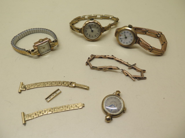 Four 9ct yellow gold ladies watches, two on 9ct sprung straps, another on a plated strap and two