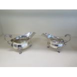Two silver sauce boats, approx 13 troy oz, some small dents and wear but no engraving