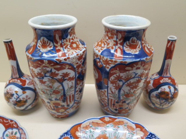 Two pairs of Imari vases, tallest 22cm and three Imari plates, all generally good minor chips to - Image 5 of 7