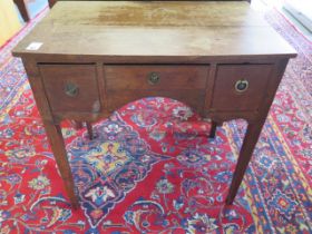 A 19th century oak three drawer side table, 73cm tall x 76cm x 47cm