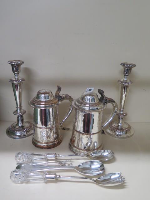 A near pair of Sheffield plate lidded tankards, 20cm tall, some wear to plate, one has a wooden