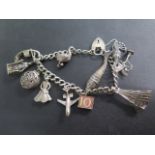 A silver charm bracelet, approx 71 grams