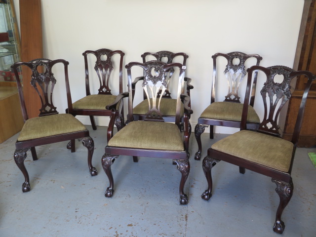 A set of six (4 + 2) mahogany dining chairs circa 1900s stamped 23WIMODL and a label Howard and Son