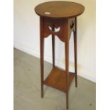 An oak Art Nouveau plant stand, 100cm tall x 34cm diameter