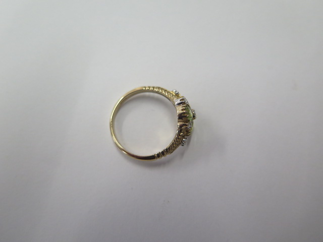 A 9ct yellow gold peridot and diamond ring, size M 1/2, hallmarked in good condition - Image 3 of 3