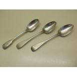 A pair of Irish silver table spoons, Dublin 1823, maker Joshua Buckton, 23cm long and another silver