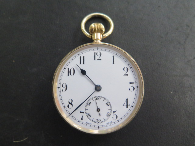 A 9ct top wind pocket watch with a base metal dust cover, 45mm case, not working and glass loose,