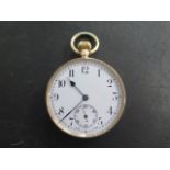 A 9ct top wind pocket watch with a base metal dust cover, 45mm case, not working and glass loose,