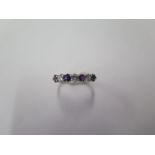 A hallmarked 18ct yellow gold diamond and amethyst ring, size P/Q, approx 2.6 grams in good