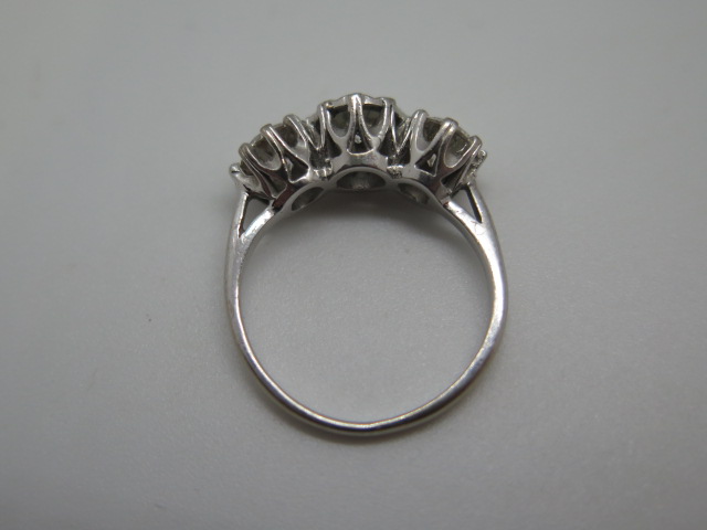 A hallmarked 18ct white gold three stone diamond ring, the outer diamonds approx 0.55ct each, the - Image 6 of 6