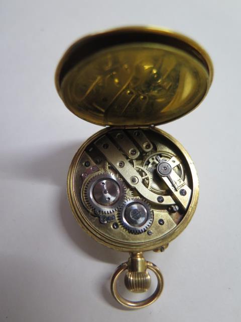 An 18ct yellow gold top wind pocket watch, 35mm case, with base metal dust cover, in running - Image 3 of 6
