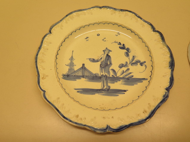Two famille rose decorated plates, 23cm wide, both with chips to rims and a pointing chinaman - Image 5 of 6