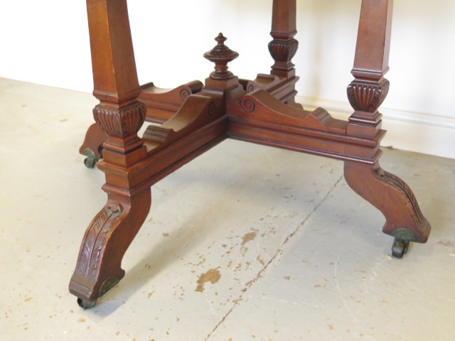 A Victorian mahogany octagonal centre table on square tapering supports and acanthus carved feet, - Image 3 of 4