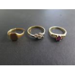 Two 18ct yellow gold rings, one missing a stone and a cut gold ring, tests to approx 18ct, total