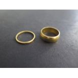 Two hallmarked 22ct yellow gold rings, sizes K, approx 7.8 grams