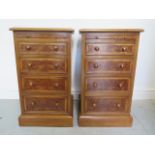A pair of burr wood veneer four drawer bedside chests each with a slide, reveneered by made by a