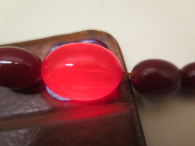 A large cherry amber type bead necklace, 72cm long, largest bead 3cm x 2.2cm, total weight approx 65 - Image 3 of 4