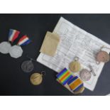Two WW1 pairs of medals 108921 2CPL C STRATTON RE with dog tags and with discharge certificate of