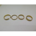 Three hallmarked 22ct band rings and a cut 22ct band ring, total weight approx 13 grams, sizes O/P/Q