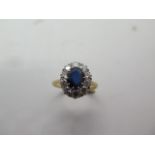 An 18ct yellow gold sapphire and diamond ring, diamonds approx 1.00ct, ring size R, head size 15mm x