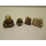 Four Japanese Meiji seated man carved ivory Netsukes, three with signatures, tallest 4cm, all good