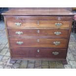 A Georgian and later mahogany bachelors chest with a brushing slide above four graduating drawers on