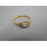 A hallmarked 18ct single stone diamond ring, size M, approx 2.2 grams, generally good