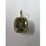 A 9ct yellow gold large citrine and diamond pendant, citrine approx 15mm x13mm, in good condition