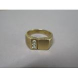 A yellow gold three stone diamond ring, size T, tests to approx 9ct, approx 8.4 grams