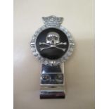 A Desmo skull and crossbones car badge, 15cm tall, in good condition