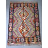 A hand knotted woollen Chobi Kilim rug, 122cm x 86cm