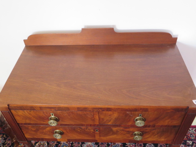 A 19th century mahogany side table with two short drawers over a single long drawer on turned reeded - Image 3 of 3