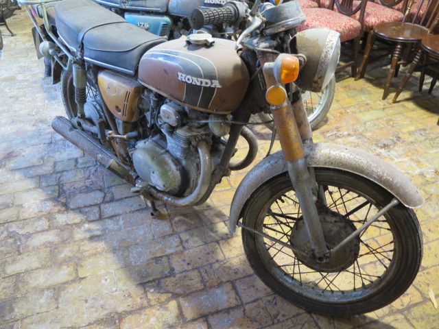 A Honda 250cc 1972 vintage motorcycle reg JOT 131L, in need of restoration with vehicle registration