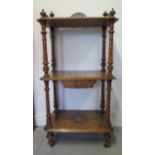 A Victorian burr walnut inlaid three tier whatnot with a fretwork gallery, 109cm tall x 55cm x 35cm