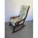A mahogany framed rocking chair of small proportions, 85cm tall x 43cm wide